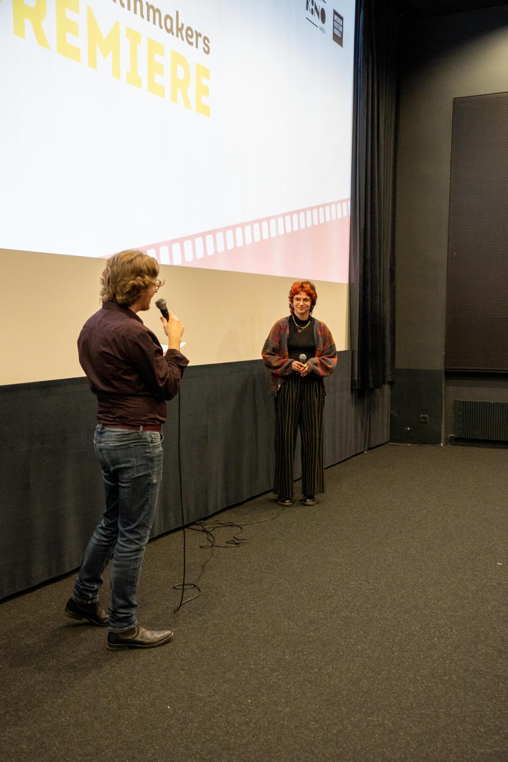 Barbara Nina Rettig im Gespräch mit Erwan Borek bei der NextGen Filmmakers Premiere im Programmkino Wels im Medien Kultur Haus Wels